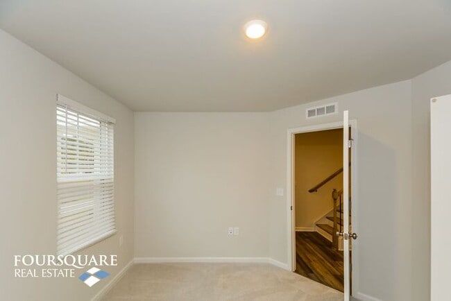 Building Photo - Modern 3-Story Townhome with First-Level Bedroom, Open Floor Plan & Community Pool – Prime RTP Lo...