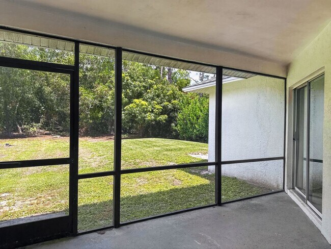 Building Photo - Annual rental offering privacy and space on 1.14 acres in Naples!