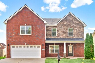 Building Photo - Pet Friendly Four Bedroom with Bonus!