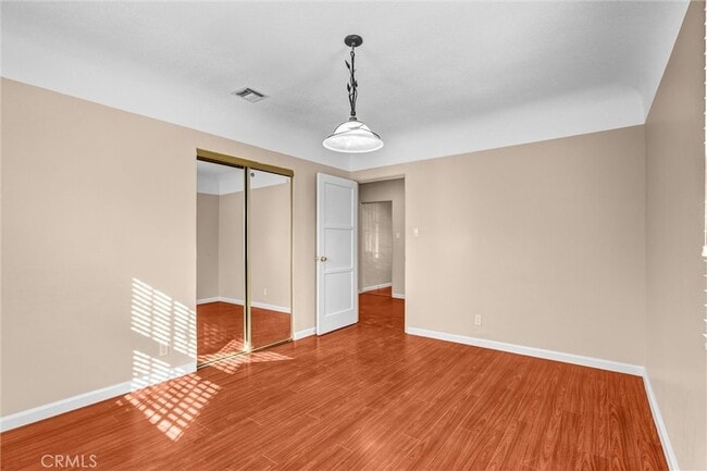 Building Photo - 9807 S Denker Ave