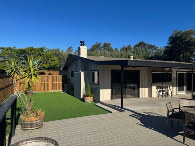 Building Photo - Stunning Deck and Pool for this Updated Mi...