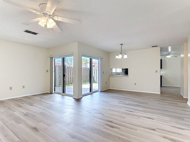 Building Photo - Spanish-Style 3 Bedroom, 2.5 Bath Mediterranean Rooftop Townhouse – Basic Cable & Wi-Fi Included!