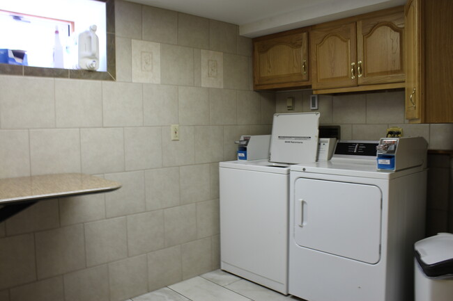 Shared laundry room on site - 48 Miller St