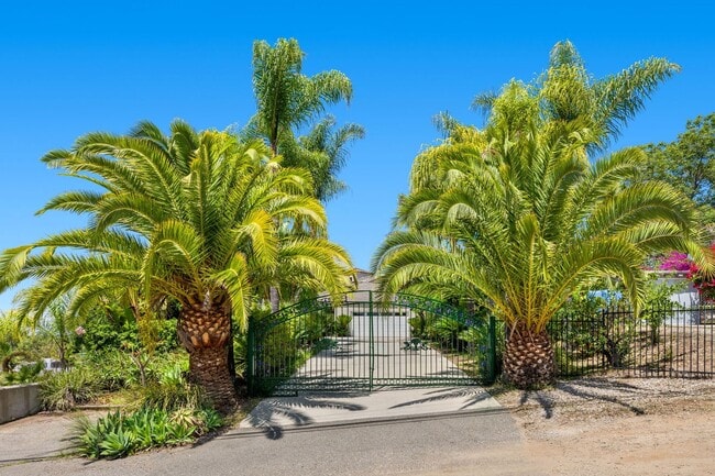 Building Photo - Beautiful Custom Built, Two-Story Home on Stunningly Landscaped Property with Gated Entrance!