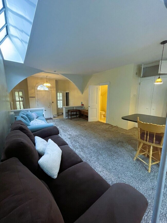 Building Photo - One Block to the Diag! Charming Home with Private Courtyard + Parking