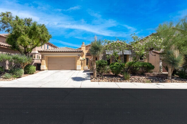 Building Photo - Spacious Mountain’s Edge Home with Den, Sunroom, 3-Car Garage & Private Spa Retreat