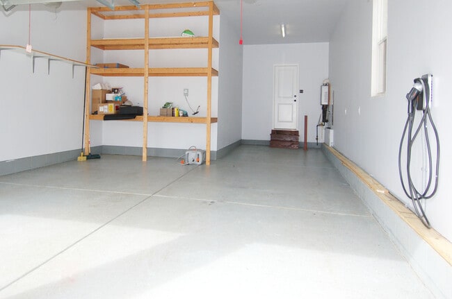 Garage with storage and EV charger - 4832 Millens Bay Ct