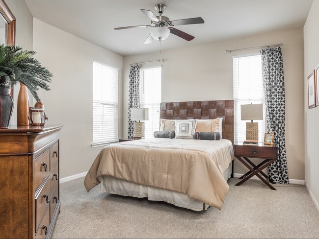 Large Bedroom with Ceiling Fan - Talison Row at Daniel Island Apartments