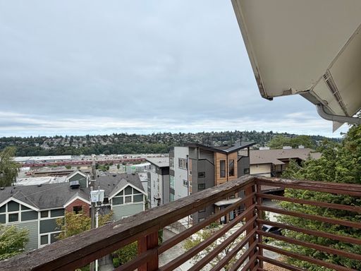 Building Photo - Industrial-Style Queen Anne Townhome with water views on every floor! AVAILABLE NOW!