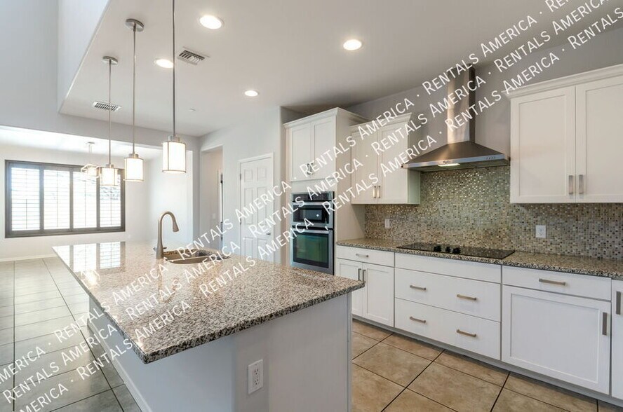 Building Photo - 5768 S Tiger Lily Pl