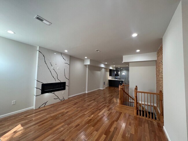 Building Photo - East District 3 BR/3.5 BA End Row Home w-Private Parking