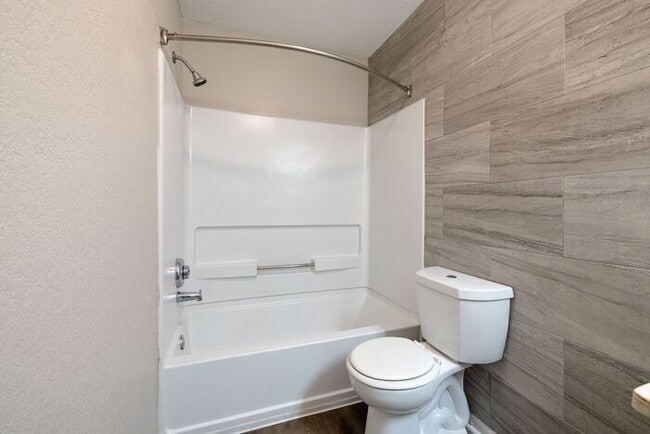 Building Photo - Spacious 2-Bedroom Elite Apartment with Private Balconies & Washer/Dryer