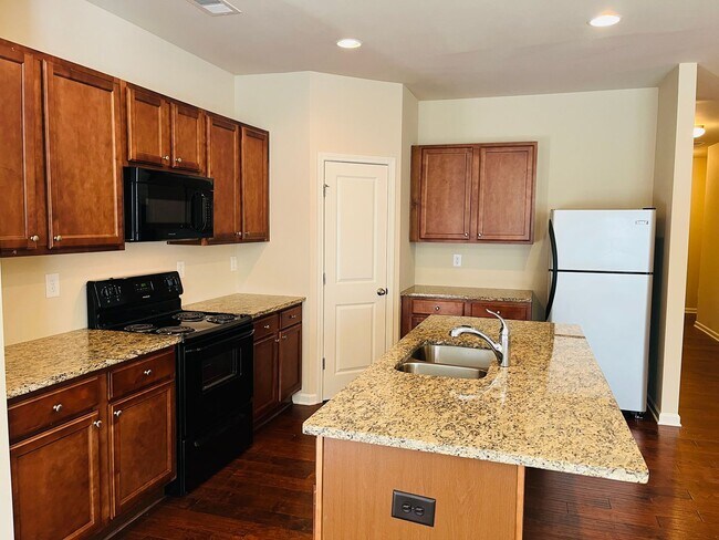 Building Photo - Wow! Check out this charming 3-bedroom, 2....