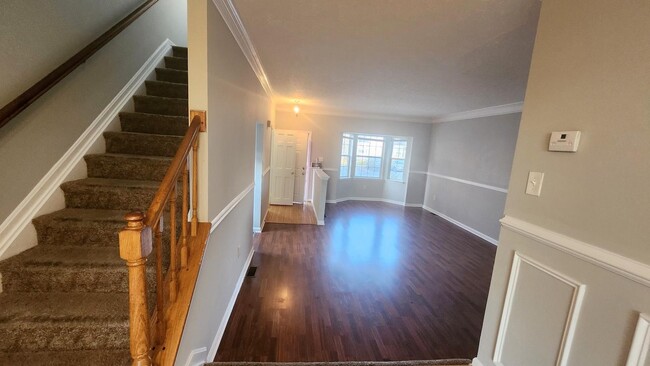 Building Photo - "Spacious 3-Bedroom Townhouse with Finishe...