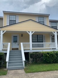 Building Photo - This charming 3-bed, 2.5-bath townhome is available for rent.