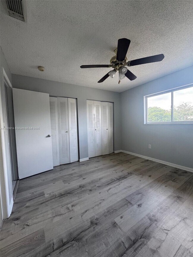 Building Photo - 7965 W 30th Ct