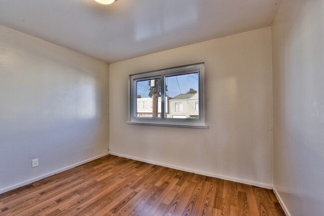 Building Photo - Light filled home+ Pet Friendly + Deck+ Lo...