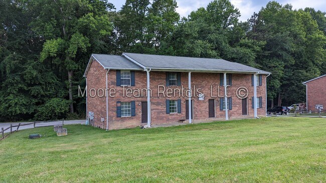 Building Photo - 2 Bed/1.5Ba - Includes - Water, Septic, Trash & Lawn - Sec 8
