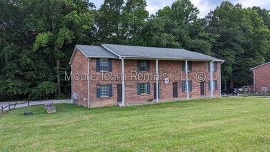 Building Photo - 2 Bed/1.5Ba - Includes - Water, Septic, Trash & Lawn - Sect 8