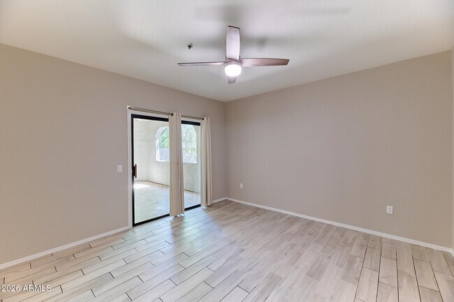 Building Photo - 9555 E Raintree Dr