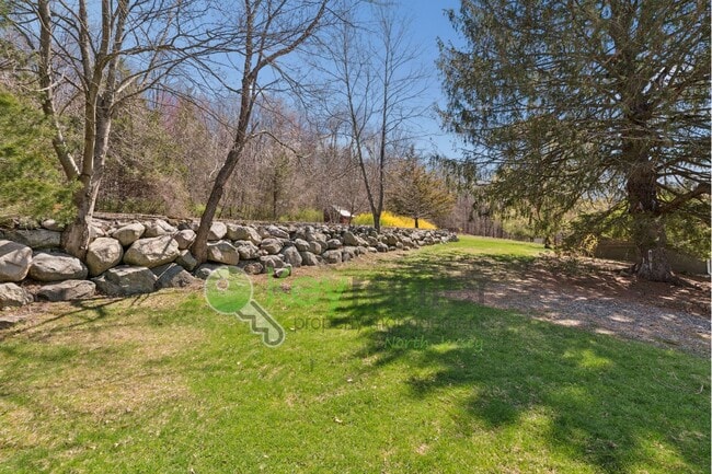 Building Photo - Charming 4-Bedroom Home on 2 Acres—Woods, Trails & Exceptional Storage