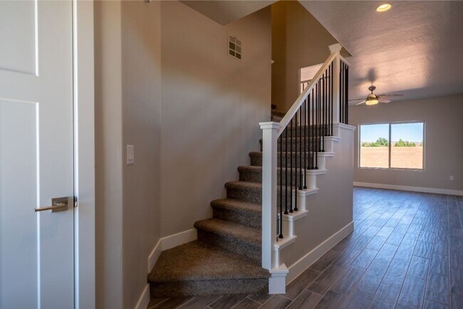 Building Photo - Amazing views! Like New 3 bedroom, 2.5 bath townhome, 2 car garage