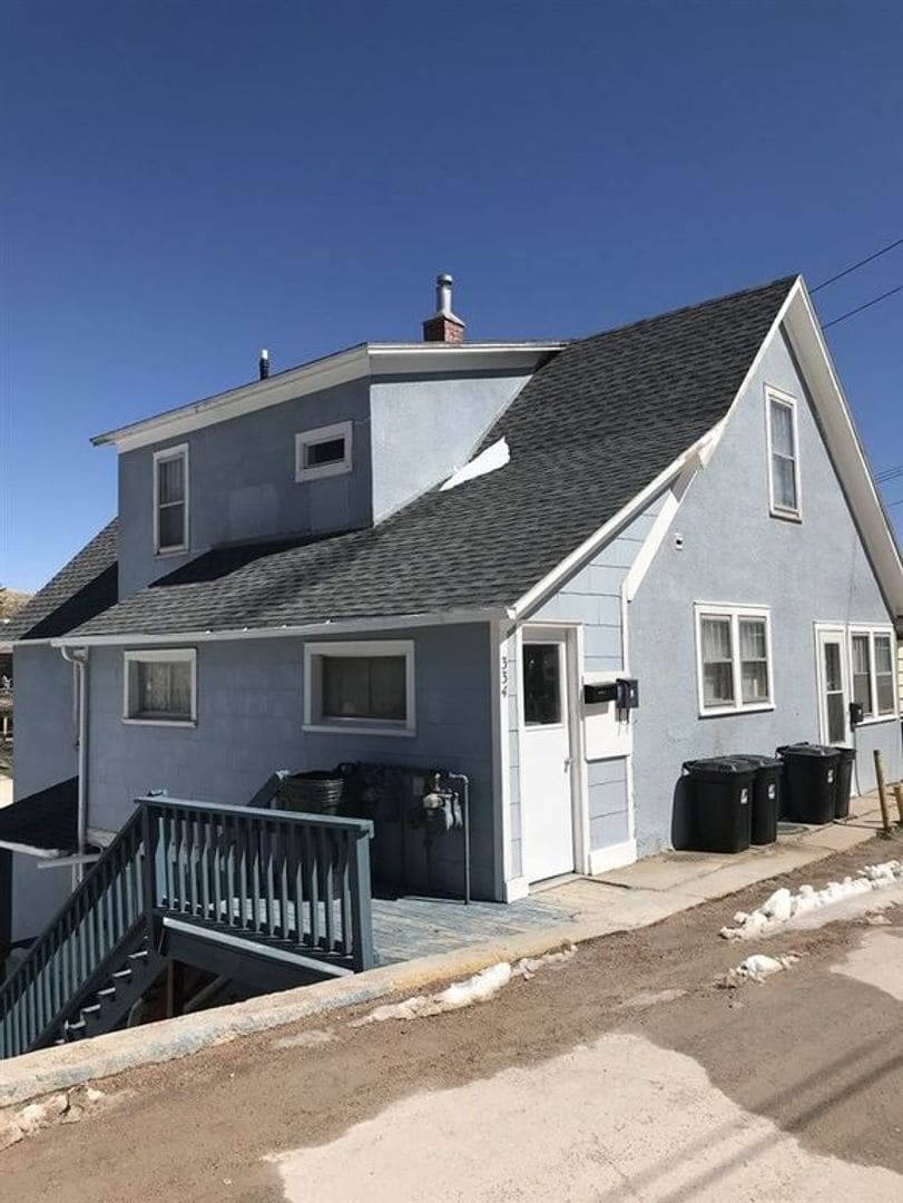 Front- Stairs down to unit - 334 Gwinn Ave