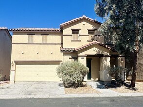Building Photo - SPACIOUS HOUSE WITH LAMINATED HARDWOOD FLOORS AND TILE THROUGHOUT! MASTER BEDROOM SEPARATE FROM O...