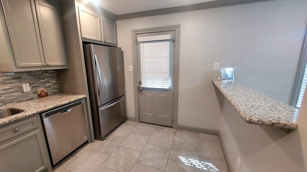 Kitchen with Eat-In Bar` - 3338 Blodgett St