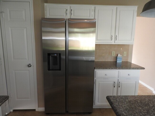 Building Photo - 3015 Cotter Lake Cir