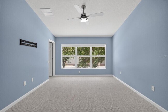 Building Photo - 10137 Pink Palmata Ct