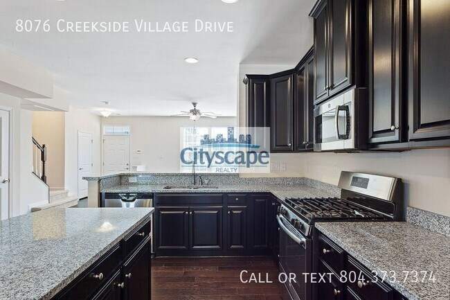Building Photo - 8076 Creekside Village Dr