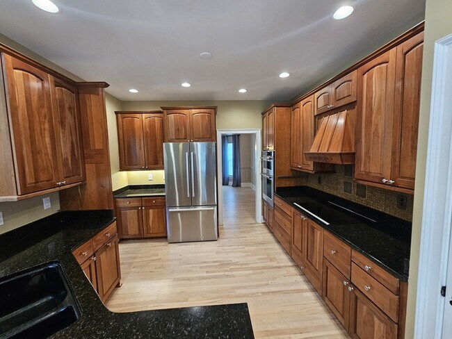 Building Photo - Lake Front Luxury in Chapin!