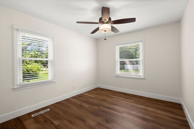 Building Photo - Spacious Split-Level Living with Dual Fireplaces & Expansive Deck