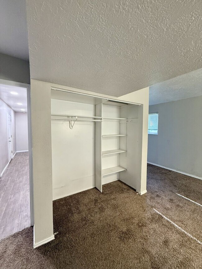 Building Photo - Spacious Comfort Meets Practical Living in...