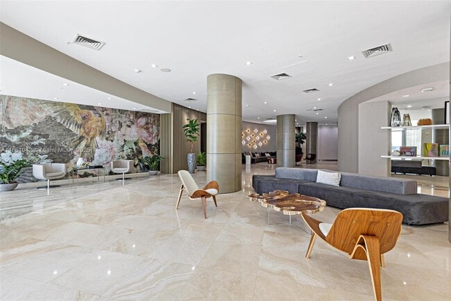 Building Photo - 10275 Collins Ave