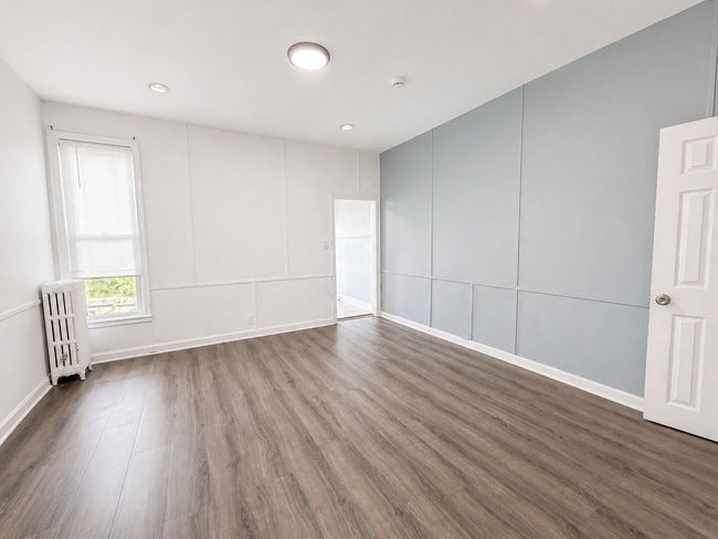 Building Photo - Home with Modern Kitchen, Finished Basement & Backyard Deck