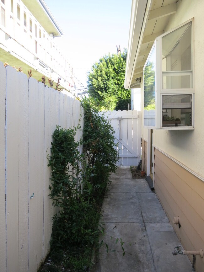 PRIVATE SIDE YARD - 10874 National Blvd