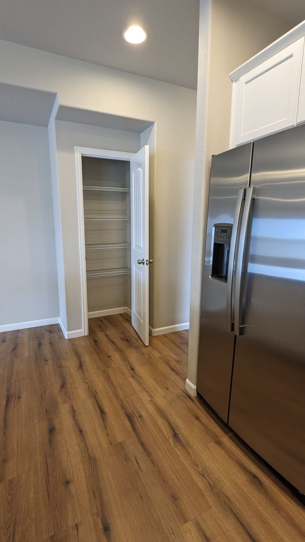 Building Photo - NEWER END UNIT TWO STORY TOWNHOME WITH A/C...