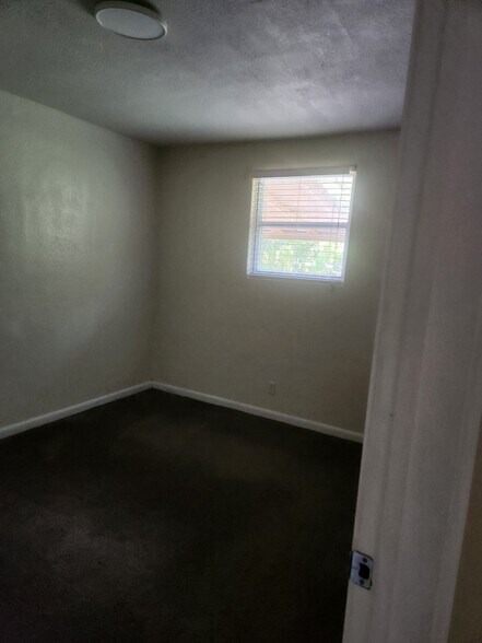 Building Photo - 6945 Woodley Dr
