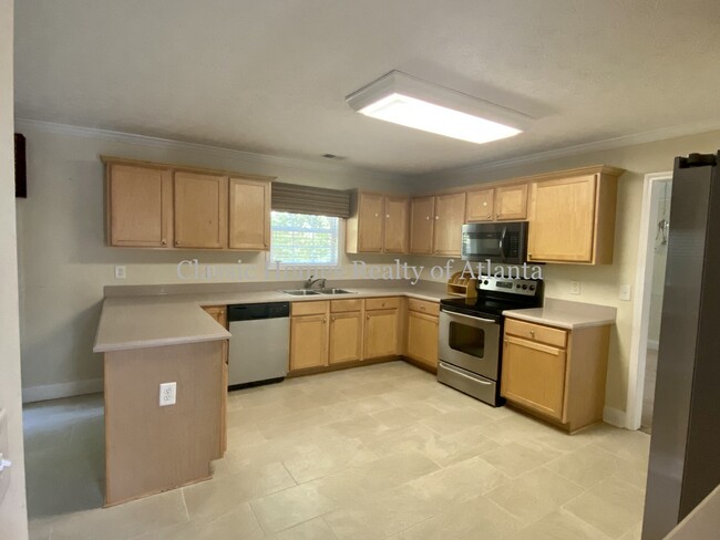 Kitchen w/ Stainless Steel Appliances - 3080 Westheimer Rd