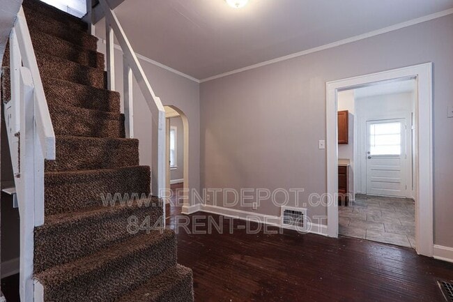 Building Photo - 1413 S Harlan Ave