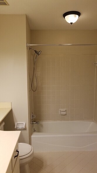 New photo coming of newly installed ceramic tile in bathroom. - 1205 Brentwood Pt
