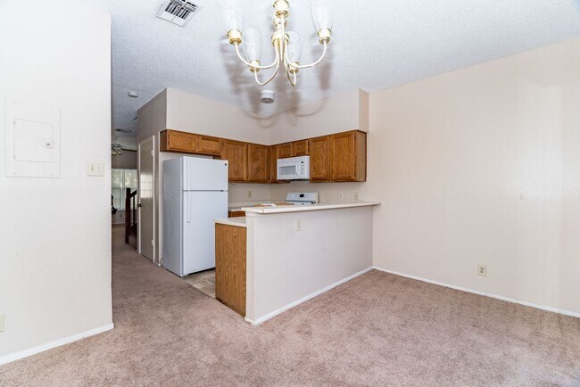 Building Photo - 12205 Magnolia Blossom St