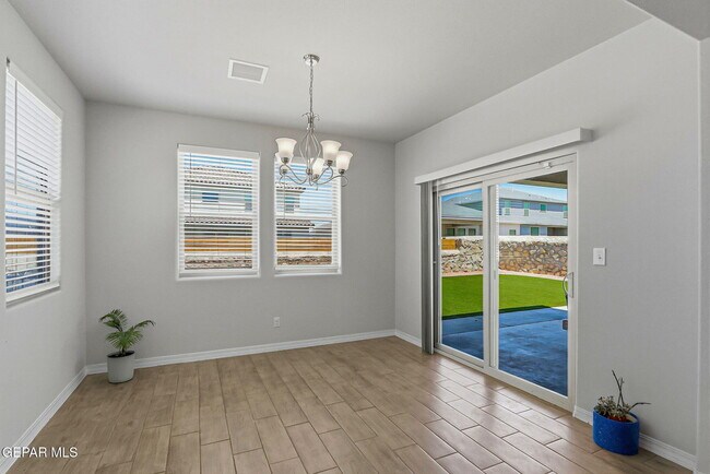 Building Photo - 7509 Enchanted Pk Dr