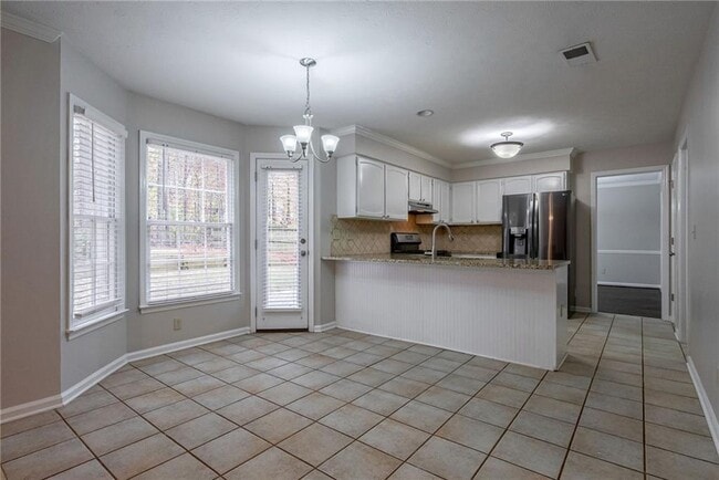 Building Photo - 8895 Club River Dr