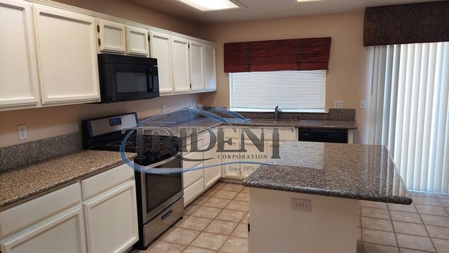 Building Photo - This is a large 4 bedroom, 3 bath SOLAR house with a bonus room upstairs