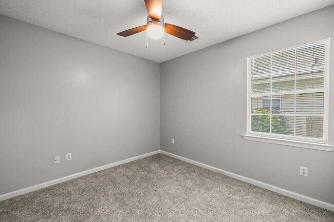 Building Photo - Charming All-Brick Home with Garage & Covered Patio!