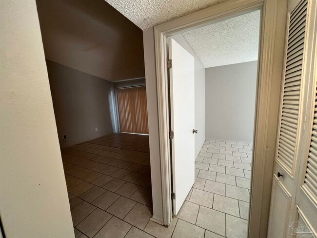 Building Photo - 6809 Tiki Ln