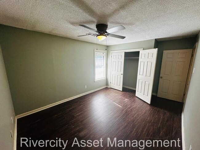 Building Photo - charming three-bedroom, two-full-bath resi...